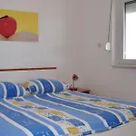 Bm *
